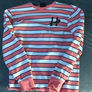 HUF pink, white, and black long sleeve tee shirt